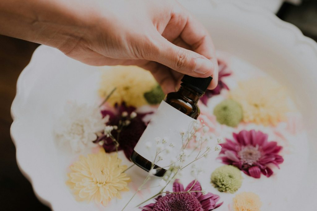 person holding bottle